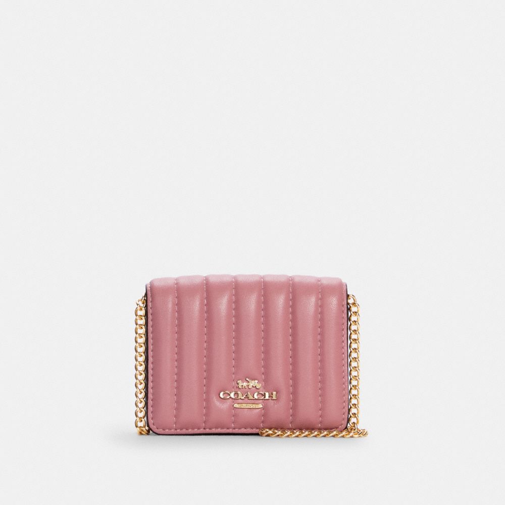 Coach flap belt online bag with linear quilting