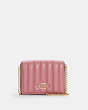 COACH®,MINI WALLET ON A CHAIN WITH LINEAR QUILTING,Mini,Gold/True Pink,Front View