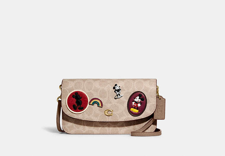 COACH®,DISNEY X COACH HAYDEN CROSSBODY IN SIGNATURE CANVAS WITH PATCHES,Signature Coated Canvas/Pebble Leather/S...,Brass/Sand Taupe,Front View