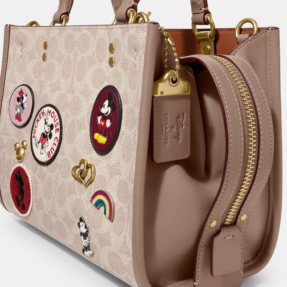 COACH®  Disney X Coach Large Pouch In Signature Canvas With Patches