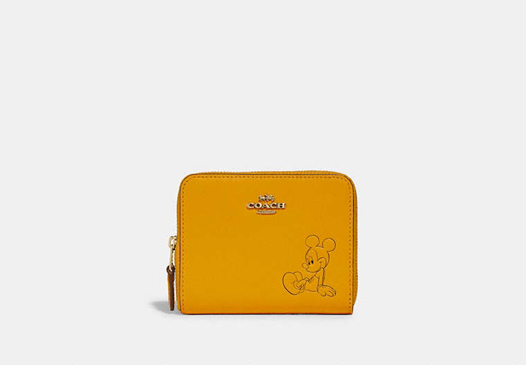 COACH®,DISNEY X COACH SMALL ZIP AROUND WALLET WITH MICKEY MOUSE,Smooth Leather,Mini,Brass/Buttercup,Front View