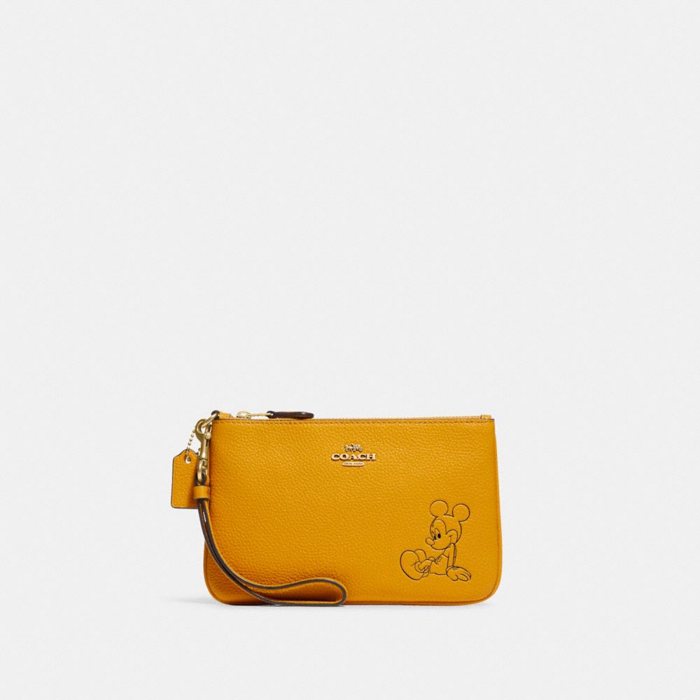 COACH®,PETIT WRISTLET DISNEY X COACH AVEC MICKEY MOUSE,Cuir galet,Laiton/Bouton d’or,Front View