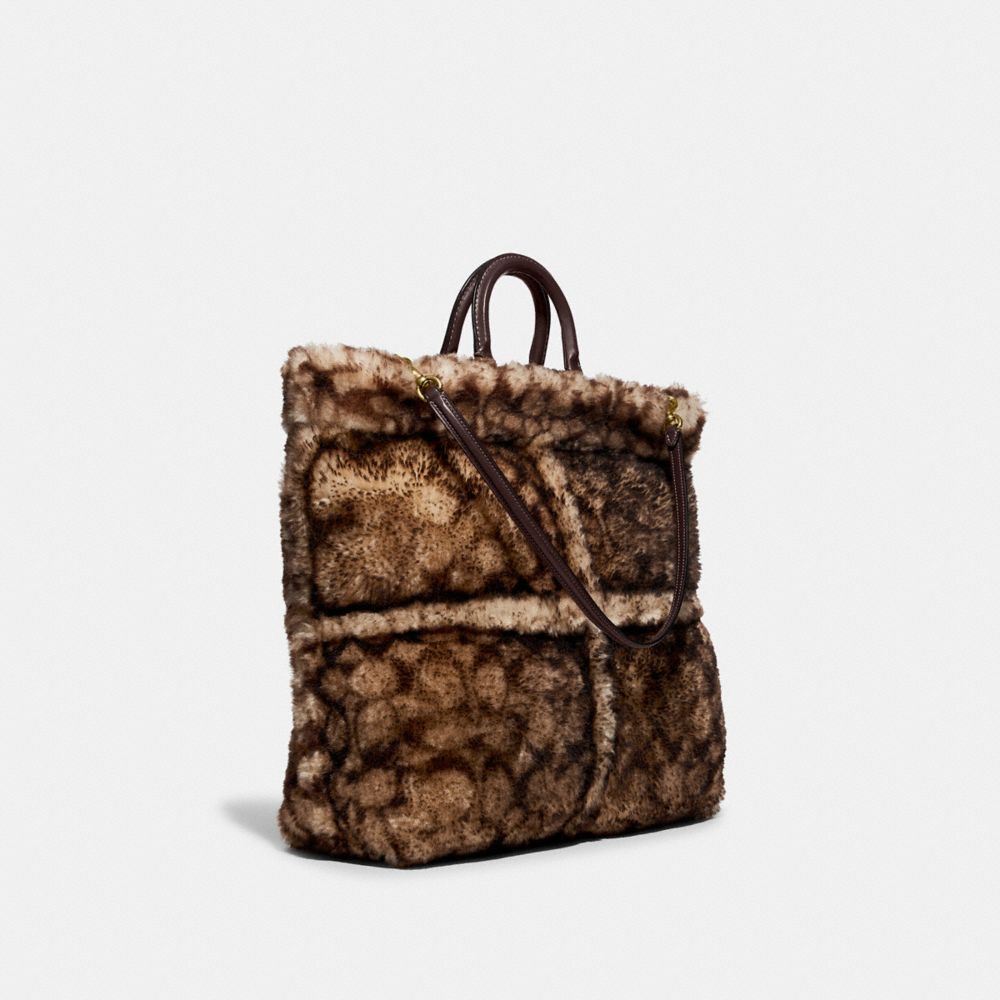 coach rogue tote in signature shearling