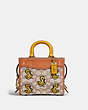 COACH®,ROGUE 17 IN SIGNATURE TEXTILE JACQUARD WITH DUCK MOTIF,Medium,Brass/Cocoa Burnished Amb,Front View