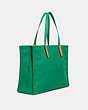 COACH®,TOTE 42 IN 100 PERCENT RECYCLED CANVAS,X-Large,Brass/Amazon Green,Angle View