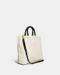COACH®,TOTE 29 IN RECYCLED CANVAS WITH TROMPE L'OEIL PRINT,Medium,Brass/NATURAL MULTI,Angle View