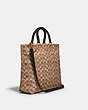COACH®,ROGUE TOTE 29 IN RECYCLED SIGNATURE CANVAS WITH TROMPE L'OEIL PRINT,Medium,Brass/Tan Natural Multi,Angle View