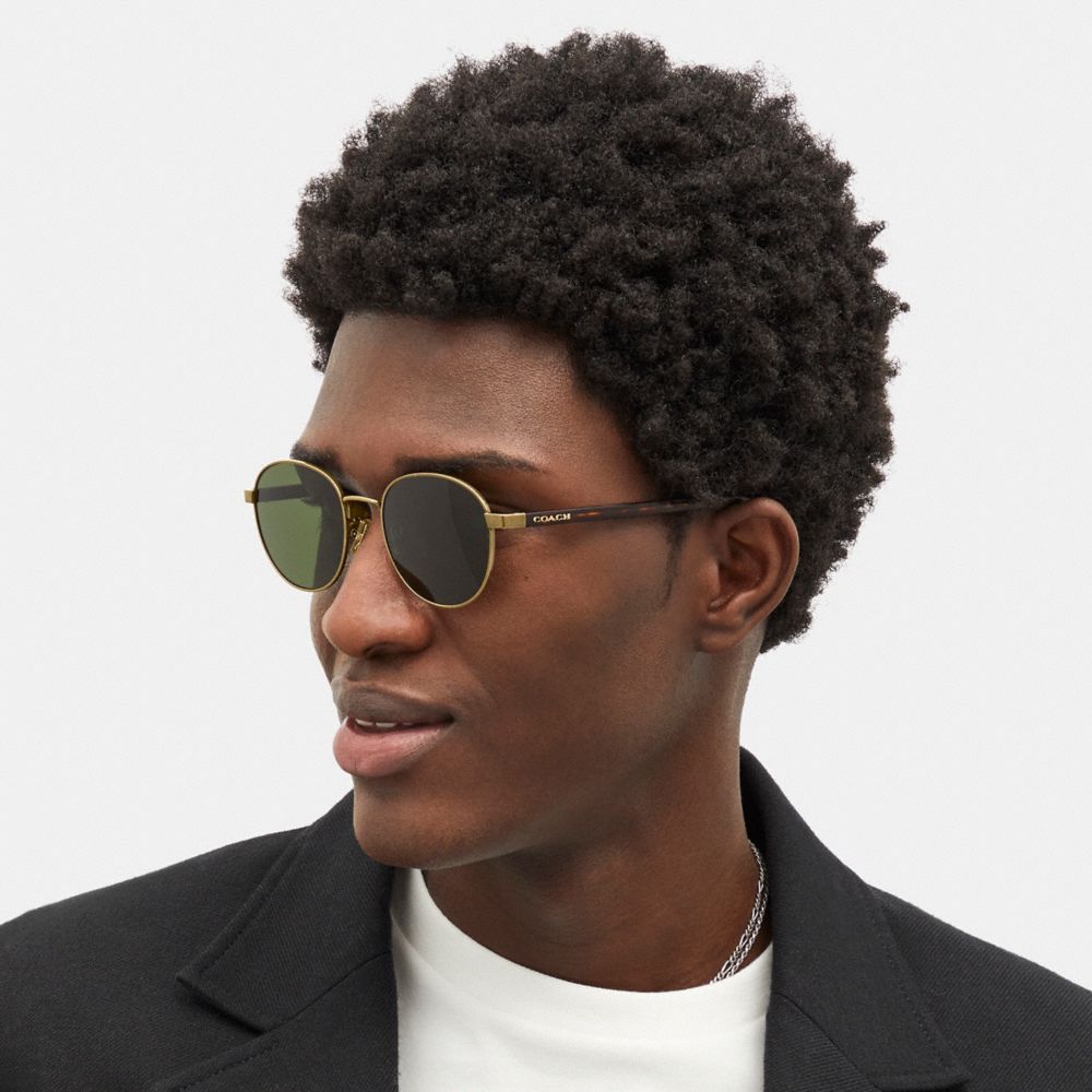 COACH®,Signature Workmark Round Sunglasses,,Angle View