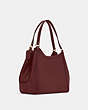 COACH®,KRISTY SHOULDER BAG,Pebbled Leather,Large,Gold/Black Cherry,Angle View