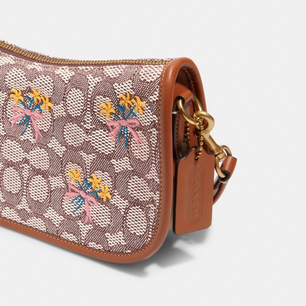 COACH®  Swinger In Signature Jacquard