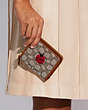 COACH®,BILLFOLD WALLET IN SIGNATURE TEXTILE JACQUARD WITH LADYBUG MOTIF EMBROIDERY,Mini,Brass/Cocoa Burnished Amb,Detail View