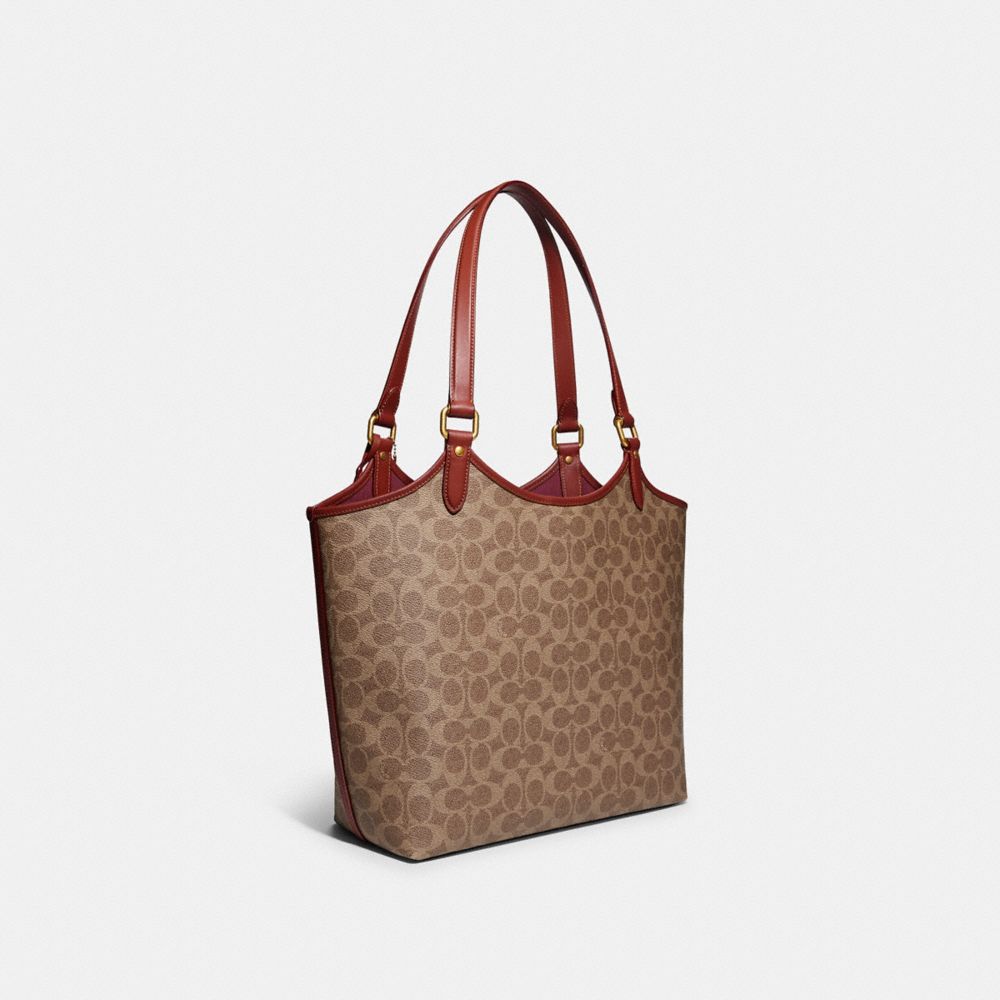COACH®,DAY TOTE BAG IN SIGNATURE CANVAS,Signature Coated Canvas/Smooth Leather,Large,Brass/Tan/Rust,Angle View