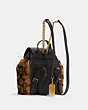 COACH®,COACH X JENNIFER LOPEZ PENNIE BACKPACK 22 IN SIGNATURE SHEARLING,Medium,Gold/Hazel Brown,Angle View