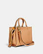 COACH®,ROGUE BAG 25 IN ORIGINAL NATURAL LEATHER,Original Natural Leather,Medium,Brass/Turmeric Root,Angle View