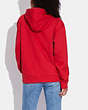 COACH®,DISNEY MICKEY MOUSE X KEITH HARING HOODIE,Red.,Scale View