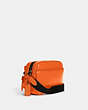 COACH®,THOMPSON SMALL CAMERA BAG,Pebbled Leather,Medium,Gunmetal/Candied Orange,Angle View