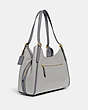 COACH®,LORI SHOULDER BAG IN COLORBLOCK,Large,Brass/Dove Grey,Angle View