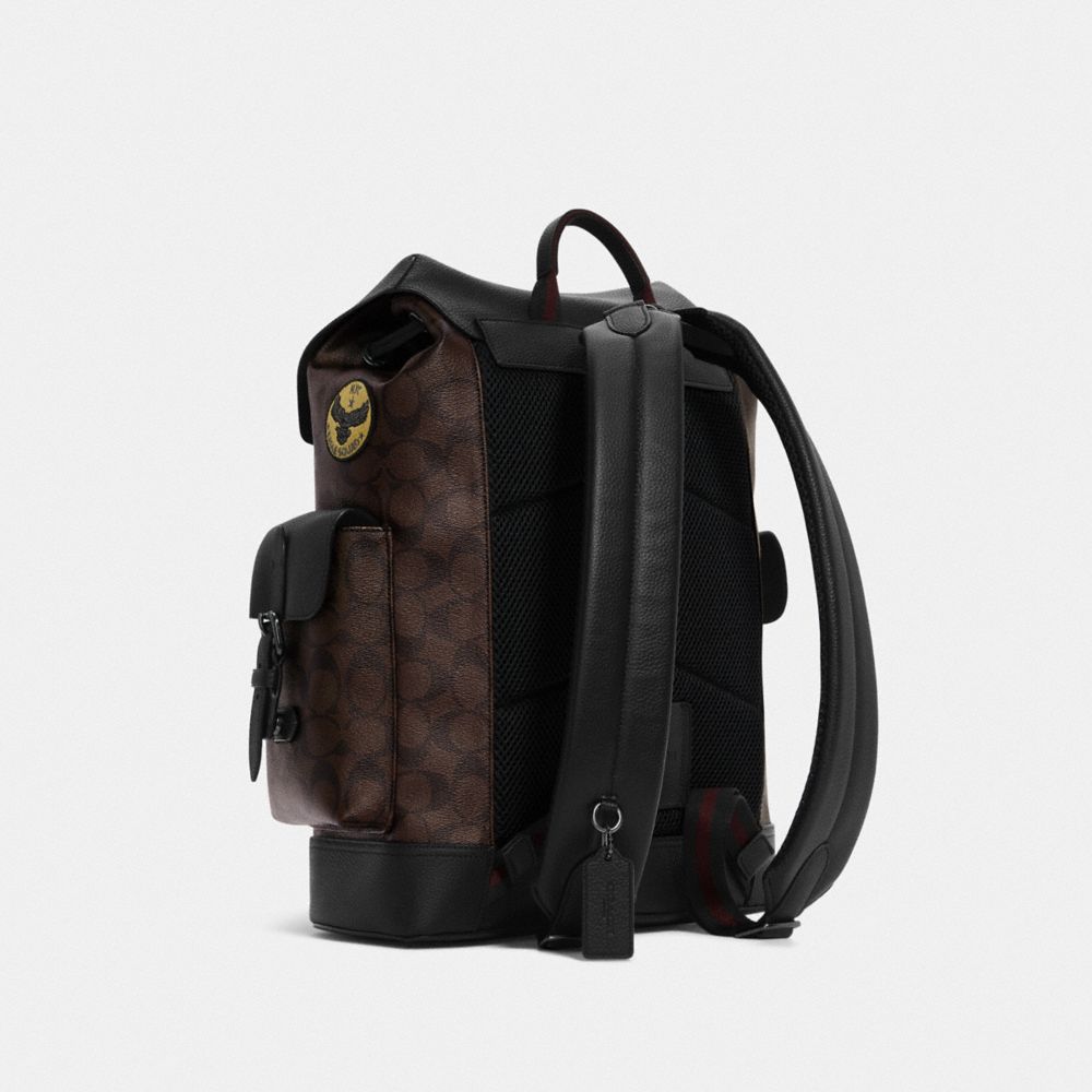 COACH®,Hudson Backpack In Signature Canvas With Souvenir Patches,,Angle View