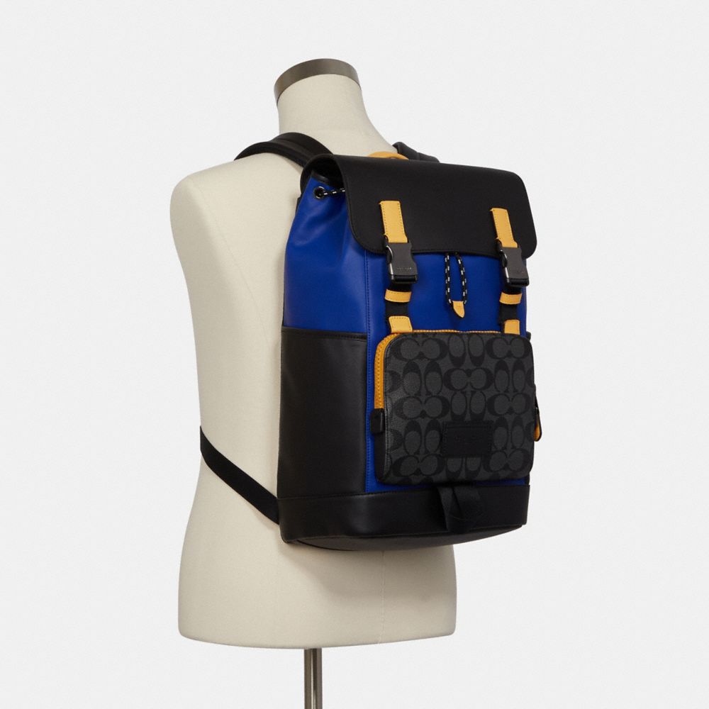 Track backpack in colorblock discount signature canvas with coach stamp