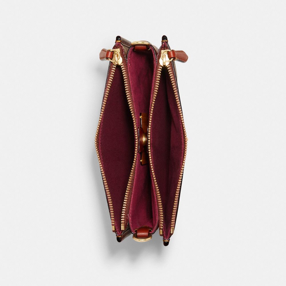 Slim Turnlock Crossbody In Signature Canvas