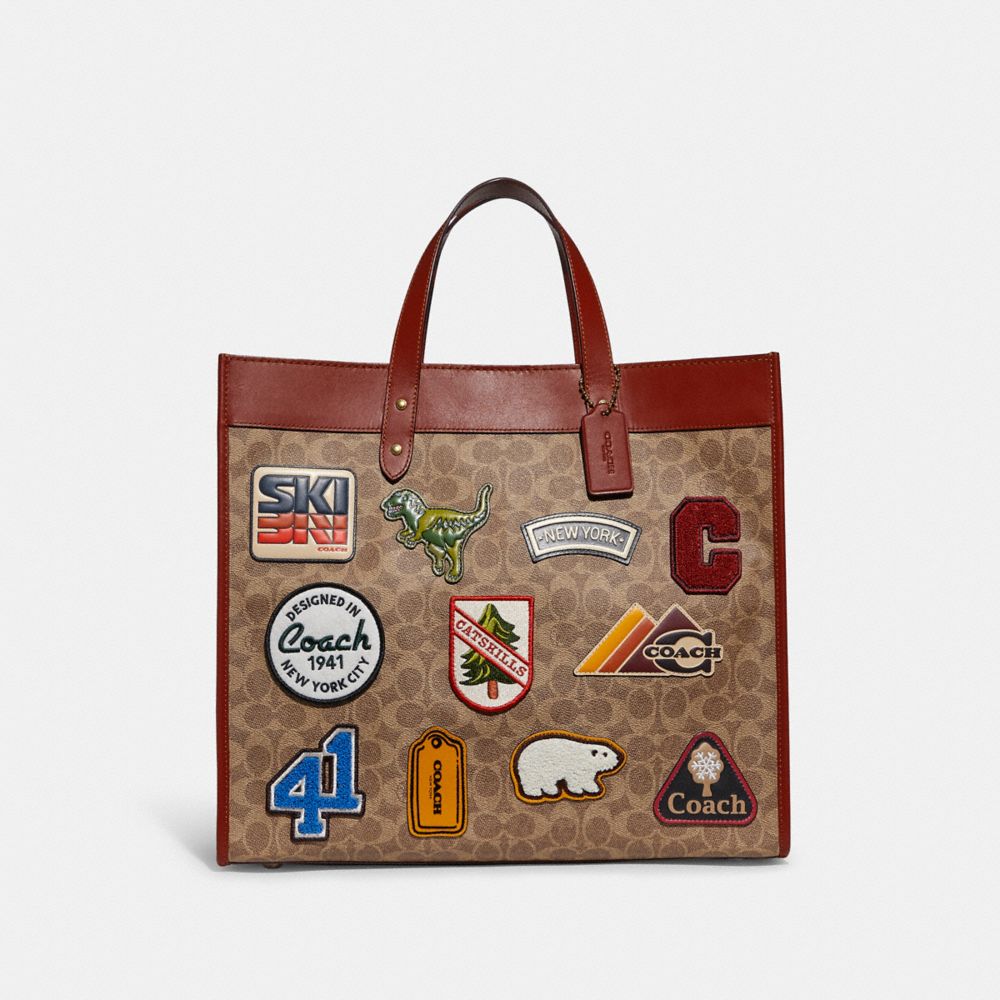 Field tote 40 in signature canvas with souvenir patches new arrivals