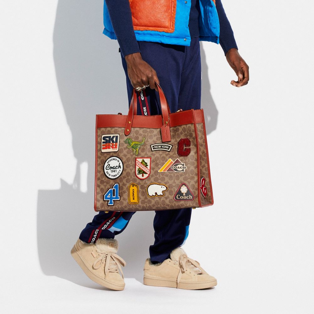 Field Tote 40 In Signature Canvas With Patches COACH