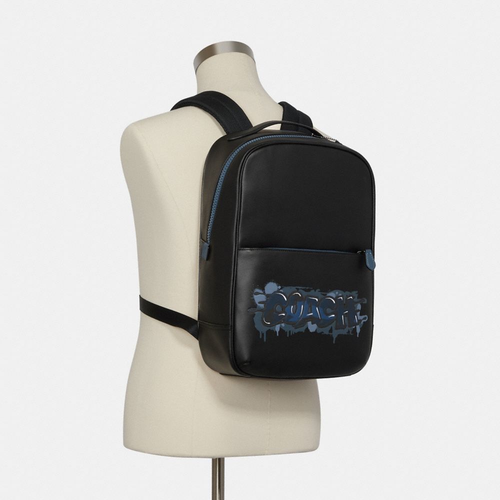 Coach graffiti backpack sale