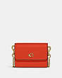 COACH®,HALF FLAP CARD CASE,Refined Pebble Leather,Brass/Red Orange,Front View
