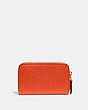 COACH®,SMALL ZIP AROUND CARD CASE,Pebble Leather,Mini,Brass/Sun Orange,Back View