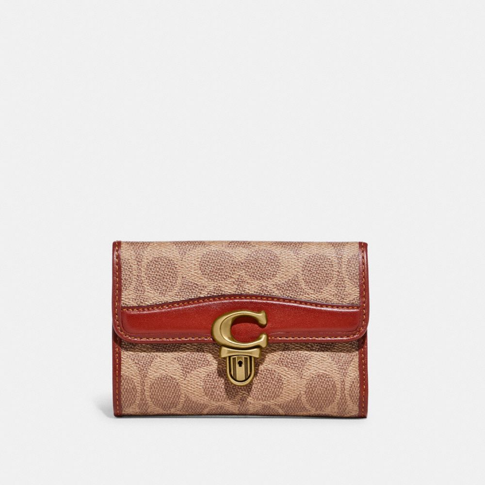 COACH®,STUDIO MEDIUM WALLET IN SIGNATURE CANVAS,Signature Coated Canvas,Brass/Tan/Rust,Front View image number 0