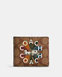 COACH®,3-IN-1 WALLET IN SIGNATURE CANVAS WITH COACH RADIAL RAINBOW,Gunmetal/Khaki Multi,Front View
