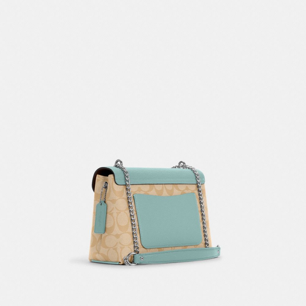 COACH®,Tammie Shoulder Bag In Signature Canvas,,Angle View
