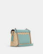 Tammie Shoulder Bag In Signature Canvas