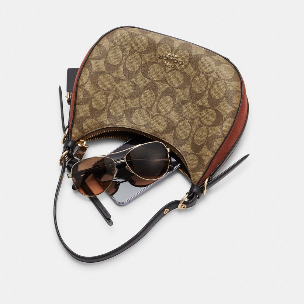 COACH®,Kleo Hobo In Signature Canvas,,Angle View