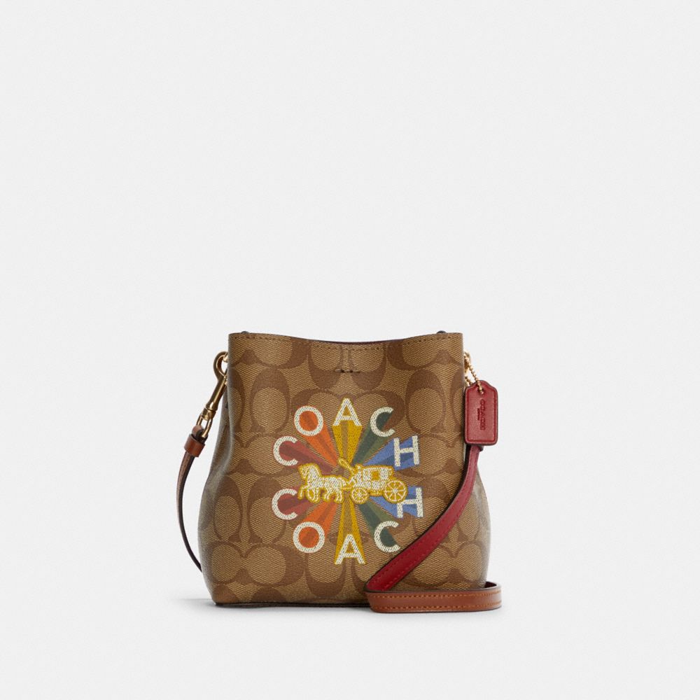 COACH®,MINI TOWN BUCKET BAG IN SIGNATURE CANVAS WITH COACH RADIAL RAINBOW,Signature Coated Canvas/Smooth Leather,Gold/Khaki Multi,Front View