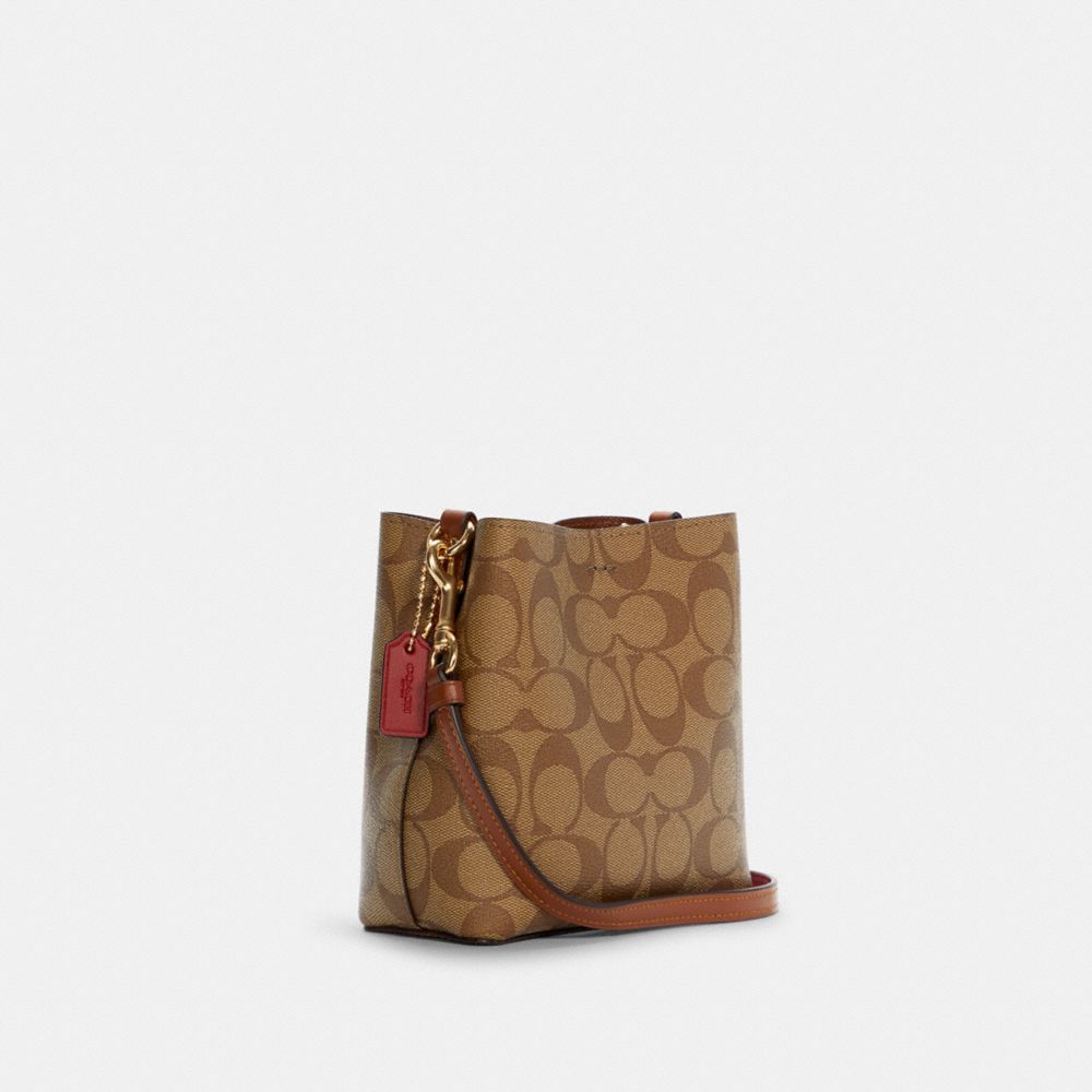 COACH®,Mini Town Bucket Bag In Signature Canvas With Coach Radial Rainbow,,Angle View