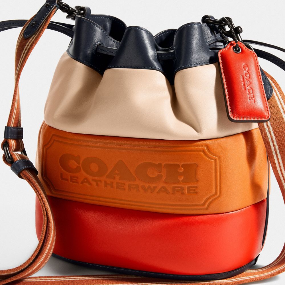 COACH® | Field Bucket Bag With Colorblock Quilting And Coach Badge