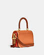 COACH®,ROGUE TOP HANDLE BAG IN COLORBLOCK,Smooth Leather,Small,Brass/Faded Orange Multi,Angle View