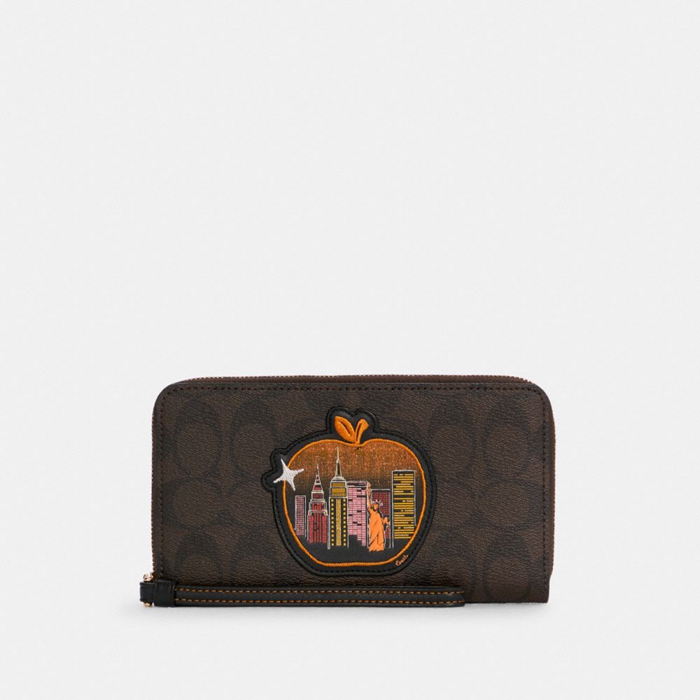 Coach large phone online wallet in signature canvas