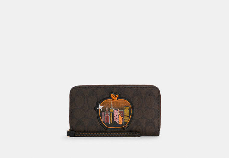 COACH®,DEMPSEY LARGE PHONE WALLET IN SIGNATURE CANVAS WITH SOUVENIR SKYLINE APPLE,Mini,Gold/Brown Black Multi,Front View