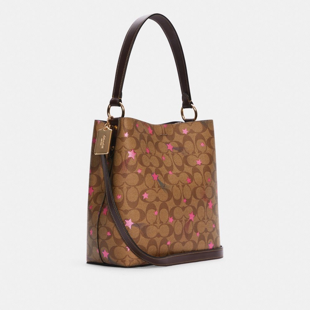 COACH®,TOWN BUCKET BAG IN SIGNATURE CANVAS WITH DISCO STAR PRINT,Large,Gold/Khaki Multi,Angle View