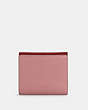 COACH®,PEPPER WALLET IN COLORBLOCK,Leather,Gold/1941 Red Multi,Back View