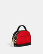 COACH®,DISNEY MICKEY MOUSE X KEITH HARING SERENA SATCHEL,Leather,Small,Gold/Electric Red Multi,Angle View