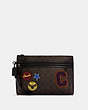COACH®,CARRY ALL POUCH IN SIGNATURE CANVAS WITH SOUVENIR PATCHES,Gunmetal/Mahogany Multi,Front View