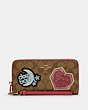 COACH®,LONG ZIP AROUND WALLET IN SIGNATURE CANVAS WITH DISCO PATCHES,Gold/Khaki Multi,Front View