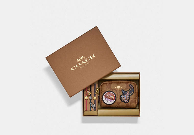 COACH®,BOXED MINI BOXY COSMETIC CASE AND HAIR TIES SET IN SIGNATURE CANVAS WITH DISCO PATCHES,Mini,Gold/Khaki Multi,Front View
