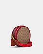COACH®,KIA CIRCLE BAG IN SIGNATURE CANVAS,Signature Coated Canvas/Smooth Leather,Small,Brass/Tan Brick Red Multi,Angle View