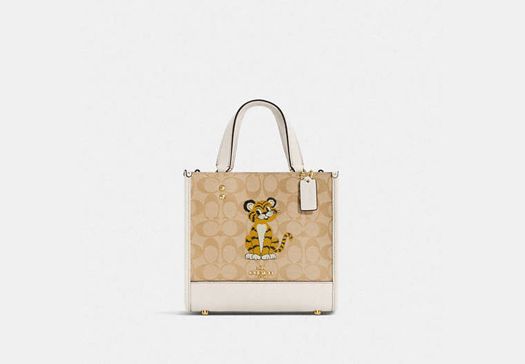 COACH®,DEMPSEY TOTE BAG 22 IN SIGNATURE CANVAS WITH TIGER,Leather,Medium,Gold/Light Khaki Chalk,Front View