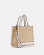 COACH®,DEMPSEY TOTE BAG 22 IN SIGNATURE CANVAS WITH TIGER,Leather,Medium,Gold/Light Khaki Chalk,Angle View