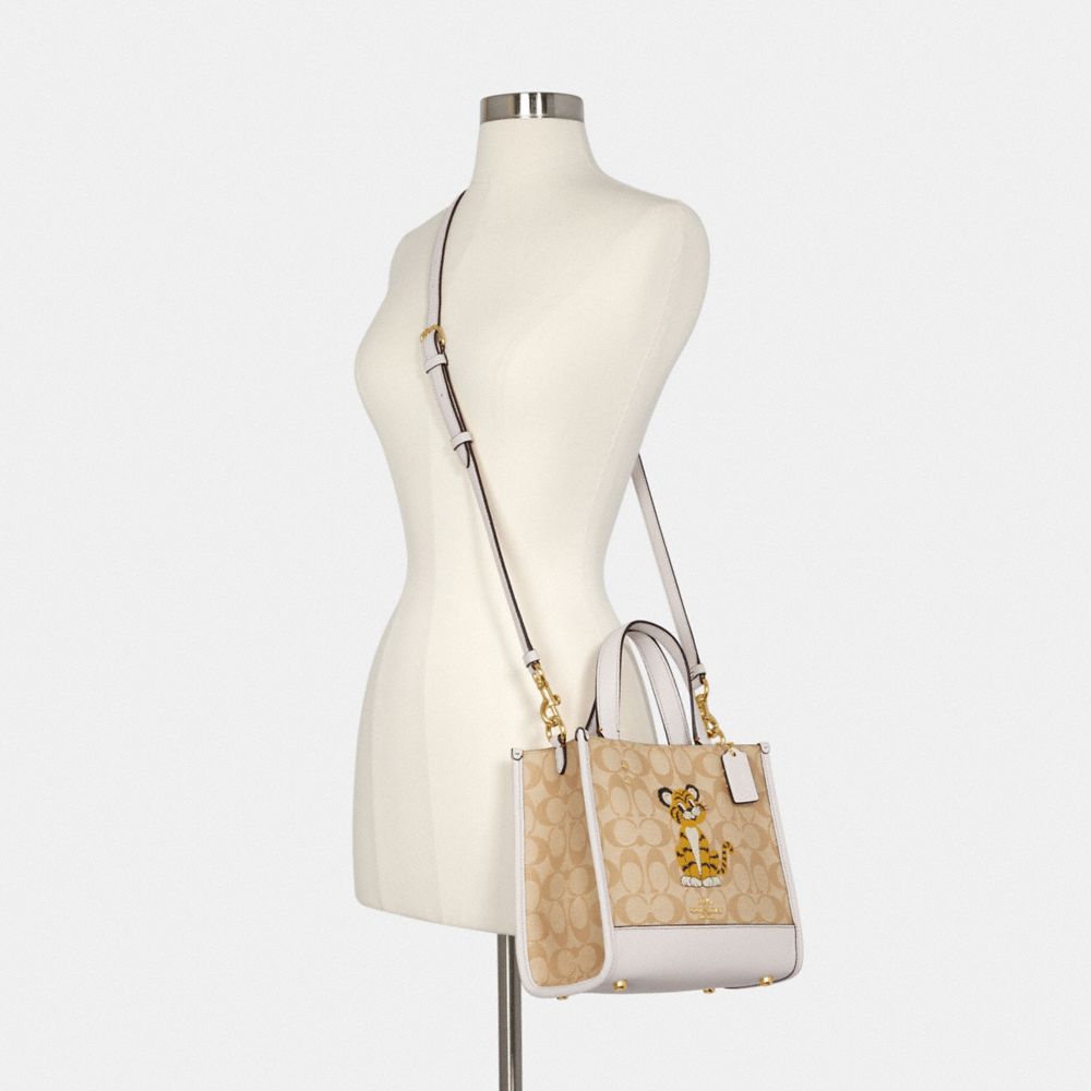 COACH® | Dempsey Tote Bag 22 In Signature Canvas With Tiger